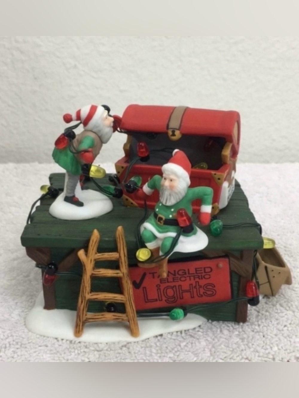 Department 56 Heritage Village Collection Untangle The Christmas Lights #56374